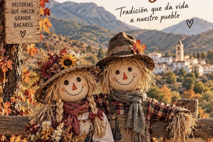 Cartel de ‘Bacares en Otoño’ con dos espantapájaros y el pueblo al fondo